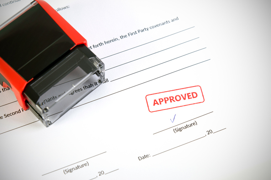 Stamp Pad over the Contract Document